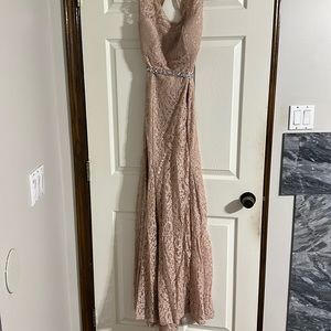 Formal dress with open back and sliver detail
